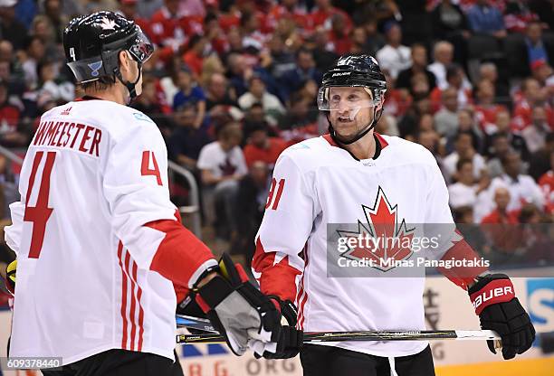 Jay Bouwmeester and Steven Stamkos of Team Canada talk between plays against Team USA during the World Cup of Hockey 2016 at Air Canada Centre on...