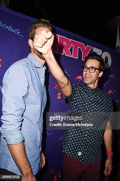 Rhett and Link arrive at the premiere of Lionsgate's 'Dirty 30' at ArcLight Hollywood on September 20, 2016 in Hollywood, California.