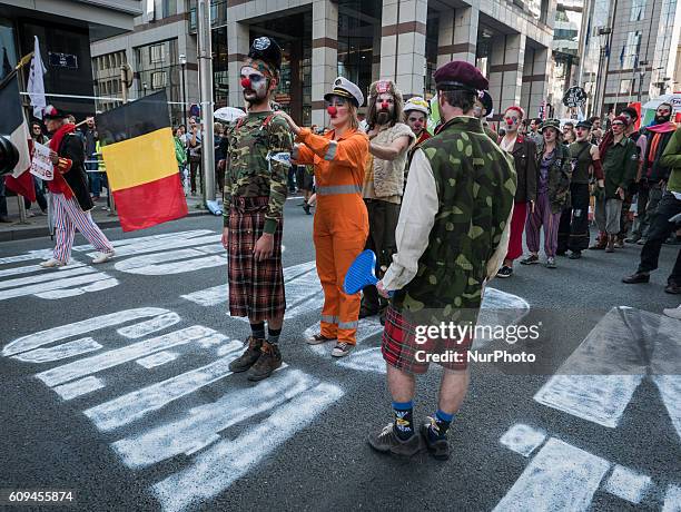 Unions, human rights and farming groups took to the streets in the Belgian capital out of concerns against the Comprehensive Economic and Trade...