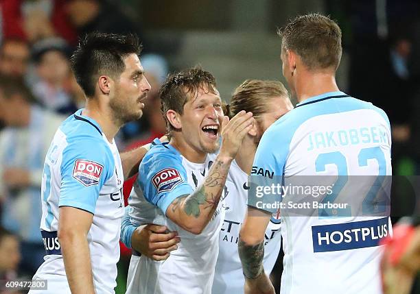 Fernando Brandan of City is congratulated by his teammates after scoring a goal during the FFA Cup Quarter Final between Melbourne and Western Sydney...