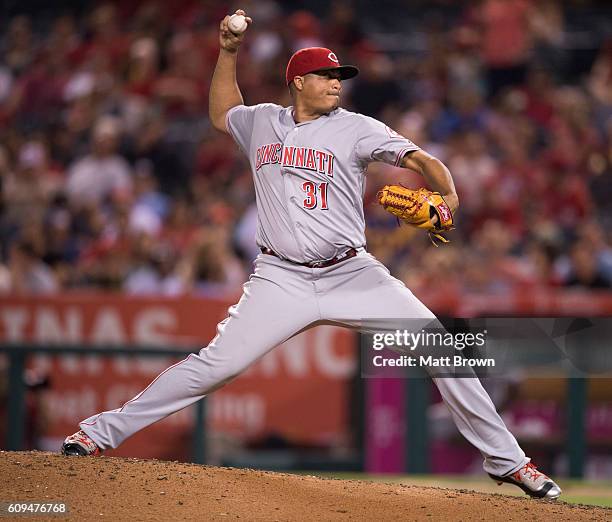 Reliever Alfredo Simon of the Cincinnati Reds pitches during the game against the Los Angeles Angels of Anaheim at Angel Stadium of Anaheim on August...