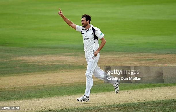 Steven Finn of Middlesex celebrates taking the wicket of Adam Lyth of Yorkshire during day two of the Specsavers County Championship match between...