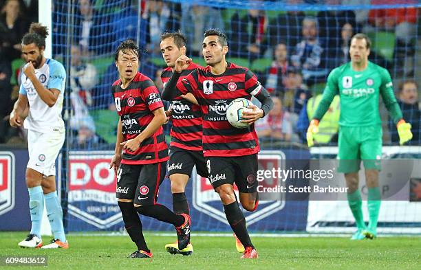 Dimas of Western Sydney celebrates after scoring their first goal during the FFA Cup Quarter Final between Melbourne and Western Sydney at AAMI Park...