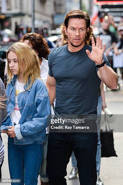 Actor Mark Wahlberg and Ella Rae Wahlberg leave the "Good Morning America" taping at the ABC Times Square Studios on September 21, 2016 in New York...