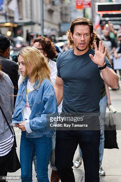 Actor Mark Wahlberg and Ella Rae Wahlberg leave the "Good Morning America" taping at the ABC Times Square Studios on September 21, 2016 in New York...