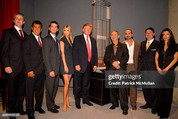 Eric Trump, Tevfik Arif, Donald Trump Jr., Ivanka Trump, Donald Trump, Tamir Sapir, Alex Sapir, Julius Schwarz and Zina Sapir attend TRUMP SOHO Press...