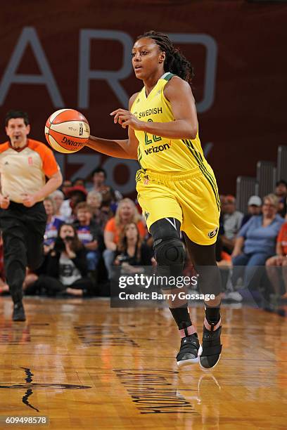 Monica Wright of the Seattle Storm dribbles the ball up court against the Phoenix Mercury on September 15, 2016 at Talking Stick Resort Arena in...