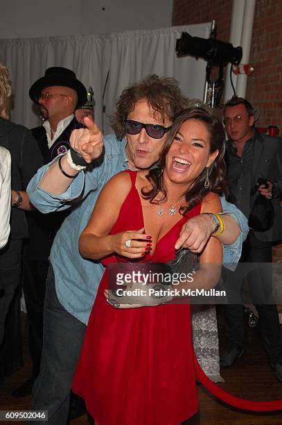 Mick Rock and Andrea Bernholtz attend amfAR ROCKS Benefit at Puck Building N.Y.C. On September 24, 2007.