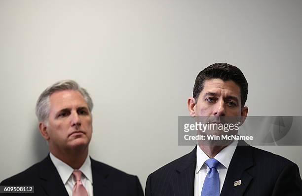 Speaker of the House Paul Ryan and House Majority Leader Kevin McCarthy listen to questions at a press conference at the U.S. Capitol on September...