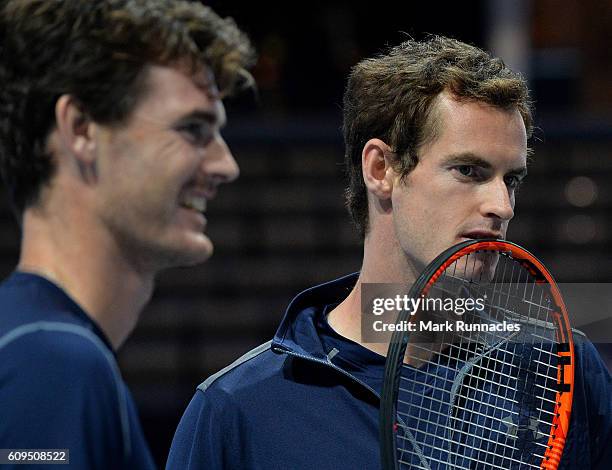 Andy Murray and brother Jamie Murray , of Scotland share a joke court side during Andy Murray Live presented by SSE at the SSE Hydro on September 21,...