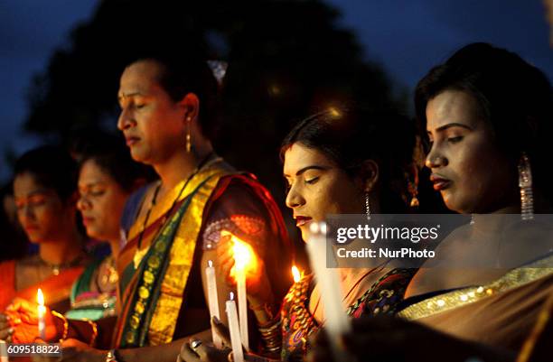 Members of the transgender community holds candle lights as they pray for died soldiers in the Uri sector of Jammu &amp; Kashmir by the Pakistan...