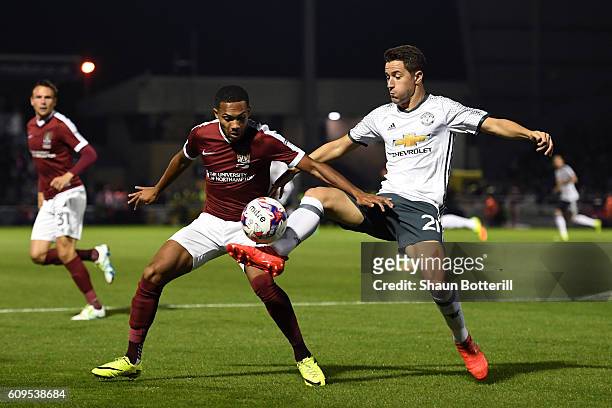 Kenji Gorre of Northampton Town in action with Ander Herrera of Manchester United during the EFL Cup Third Round match between Northampton Town and...