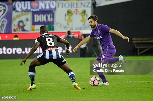 Emmanuel Agyemang Badu of Udunese Calcio competes with Hrvoje Milic of ACF Fiorentina during the Serie A match between Udinese Calcio and ACF...