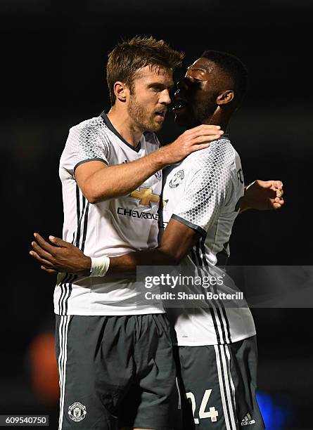 Michael Carrick of Manchester United celebrates scoring his sides first goal with Timothy Fosu-Mensah of Manchester United during the EFL Cup Third...