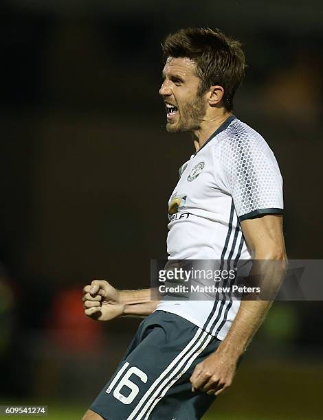 Michael Carrick of Manchester United celebrates scoring the first goal during the EFL Cup Third Round match between Northampton Town and Manchester...
