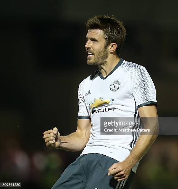 Michael Carrick of Manchester United celebrates scoring the first goal during the EFL Cup Third Round match between Northampton Town and Manchester...