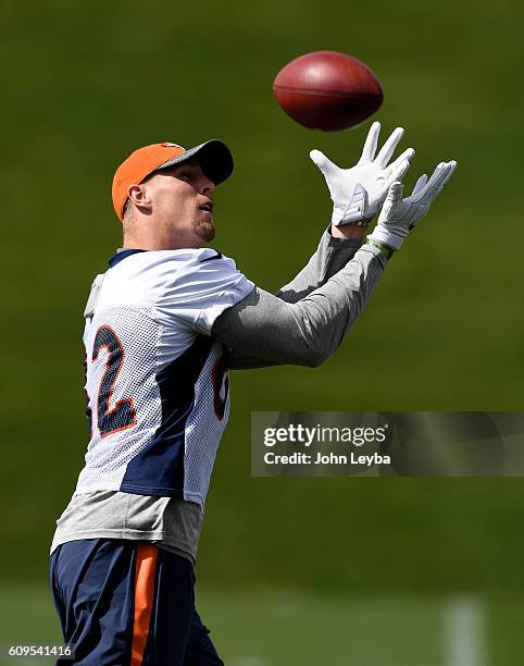 Denver Broncos tight end Jeff Heuerman catches a pass in drills during practice September 21, 2016 at Dove Valley.