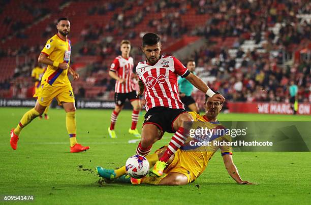 Shane Long of Southampton is fouled by Martin kelly of Crystal Palace inside the penalty area during the EFL Cup Third Round match between...