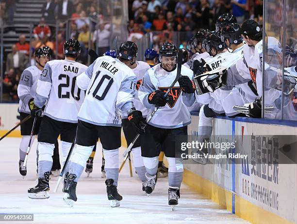 Vincent Trocheck of Team North America high fives the bench after scoring a first period goal on Team Sweden during the World Cup of Hockey 2016 at...