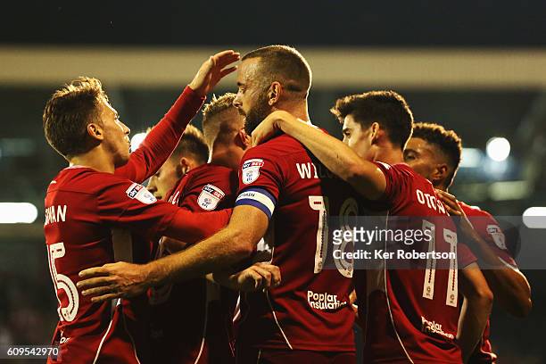 Aaron Wilbraham of Bristol City celebrates with team mates after scoring during the EFL Cup Third Round match between Fulham and Bristol City at...