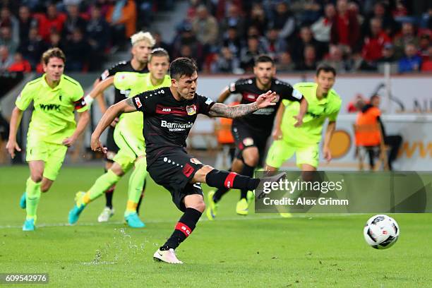 Charles Aranguiz of Leverkusen misses a penalty during the Bundesliga match between Bayer 04 Leverkusen and FC Augsburg at BayArena on September 21,...