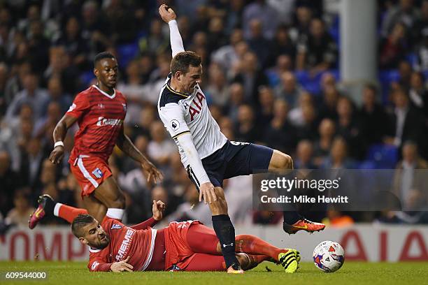 Vincent Janssen of Tottenham Hotspur and Max Ehmer of Gillingham in action during the EFL Cup Third Round match between Tottenham Hotspur and...