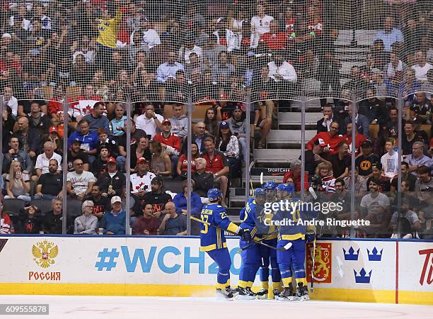 Team Sweden celebrates after scoring a first period goal goal on Team North America during the World Cup of Hockey 2016 at Air Canada Centre on...