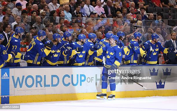 Filip Forsberg of Team Sweden high fives the bench after scoring a first period goal on Team North America during the World Cup of Hockey 2016 at Air...