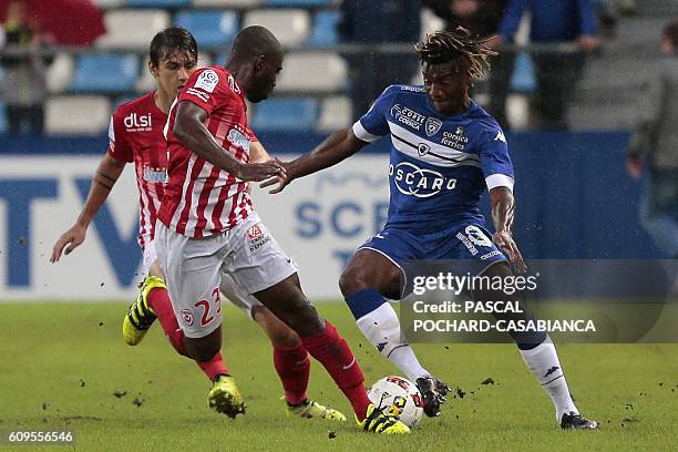 Bastia's French midfielder Allan Saint Maximin vies with Nancy's French forward Anthony Koura during the French L1 football match between Bastia and...