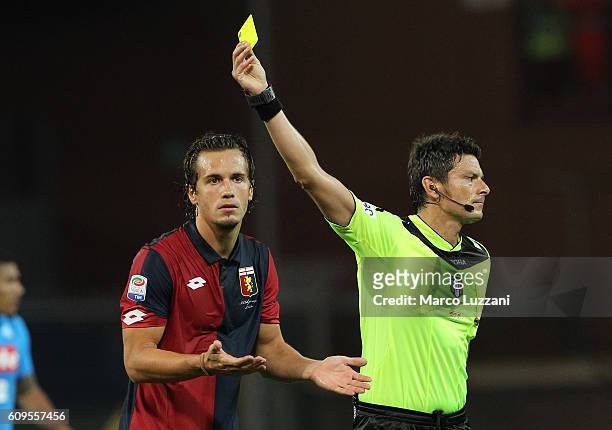 Referee Antonio Damato shows the yellow card to Lucas Orban of Genoa CFC during the Serie A match between Genoa CFC and SSC Napoli at Stadio Luigi...