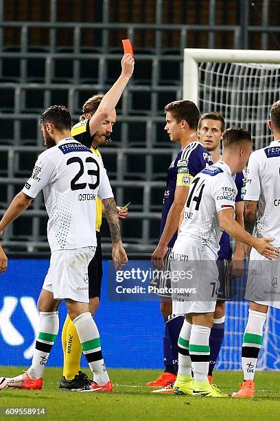 Referee Wim Smet show the red card for Leander Dendoncker midfielder of RSC Anderlecht pictured during Croky Cup match between RSC Anderlecht and OHL...