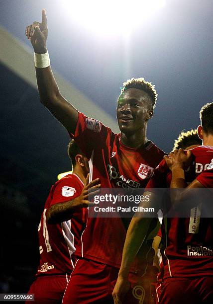 Tammy Abraham of Bristol City celebrates scoring his sides second goal with team mates during the EFL Cup Third Round match between Fulham and...