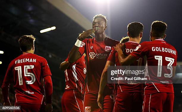 Tammy Abraham of Bristol City celebrates scoring his sides second goal during the EFL Cup Third Round match between Fulham and Bristol City at Craven...