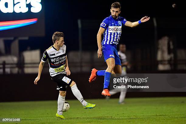 Tino Sven Susic, midfielder of KRC Genk jumps up to reach the ball in front of Wannes Van Tricht midfielder of SC Eendracht Aalst during the Croky...