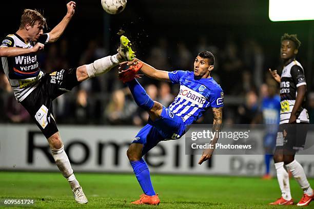 Nikolaos Karelis forward of KRC Genk is challenged during the Croky Cup 1/16 final match between SC Eendracht Aalst and KRC Genk in the Pierre...