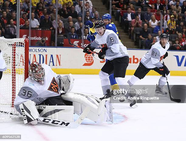 John Gibson of Team North America makes a save against Team Sweden during the World Cup of Hockey 2016 at Air Canada Centre on September 21, 2016 in...