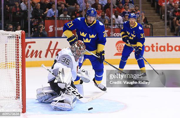 John Gibson of Team North America makes a save with Loui Eriksson of Team Sweden in front during the World Cup of Hockey 2016 at Air Canada Centre on...