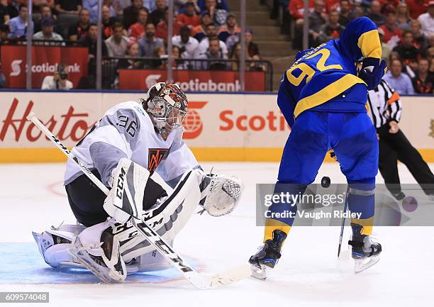 Gabriel Landeskog of Team Sweden jumps on a loose puck in front of John Gibson of Team North America during the World Cup of Hockey 2016 at Air...