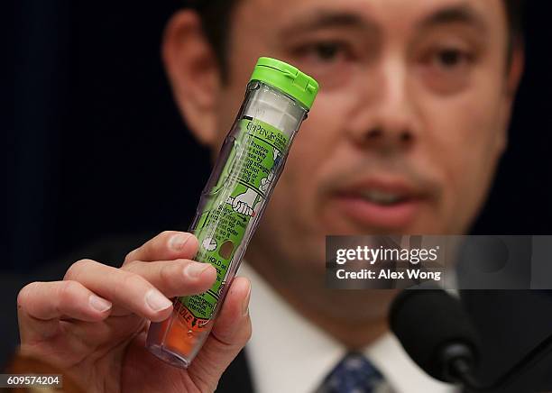 Committee chairman Rep. Jason Chaffetz holds up an EpiPen as he speaks during a hearing before the House Oversight and Government Reform Committee...