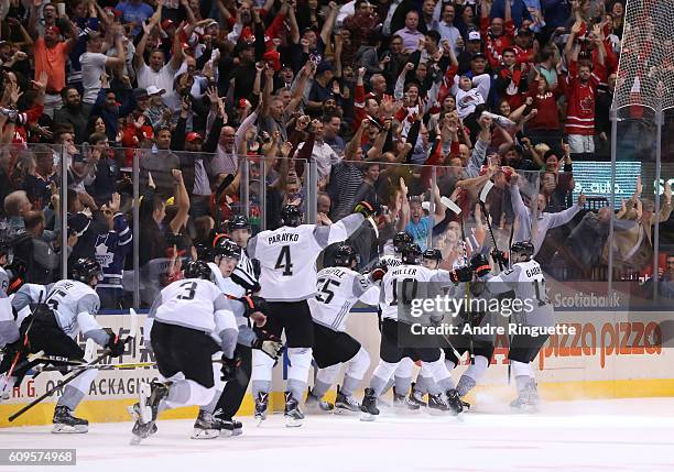 Team North America celebrates after scoring an overtime goal on Team Sweden during the World Cup of Hockey 2016 at Air Canada Centre on September 21,...