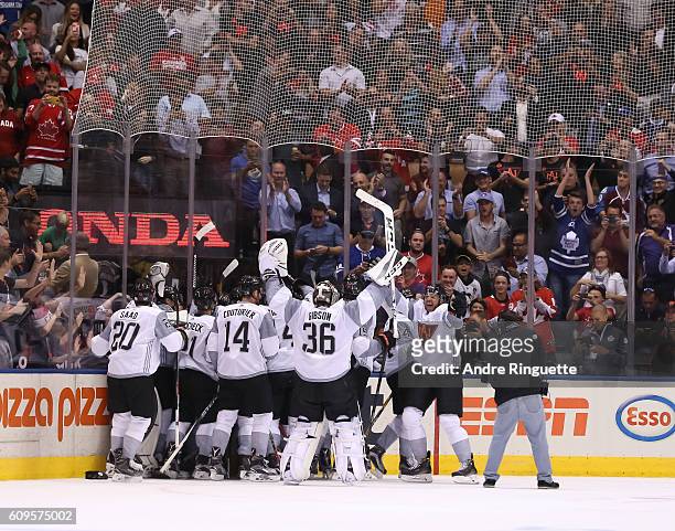 Team North America celebrates after scoring an overtime goal on Team Sweden during the World Cup of Hockey 2016 at Air Canada Centre on September 21,...