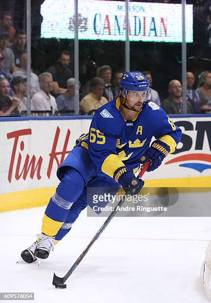Erik Karlsson of Team Sweden stickhandles the puck against Team North America during the World Cup of Hockey 2016 at Air Canada Centre on September...