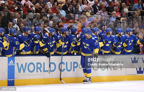 Patrik Berglund of Team Sweden high fives the bench after scoring a third period goal Team North America during the World Cup of Hockey 2016 at Air...