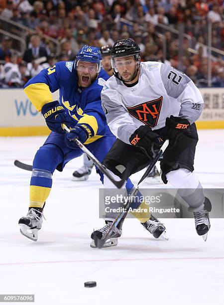 Vincent Trocheck of Team North America battles for a loose puck with Mattias Ekholm of Team Sweden during the World Cup of Hockey 2016 at Air Canada...