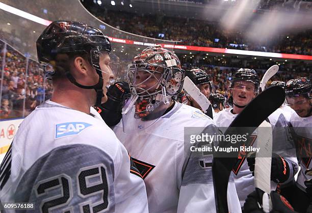Nathan MacKinnon and John Gibson of Team North America celebrate after a 4-3 overtime win over Team Sweden during the World Cup of Hockey 2016 at Air...