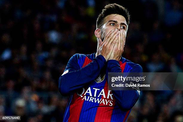 Gerard Pique of FC Barcelona reacts after missing a chance to score during the La Liga match between FC Barcelona and Club Atletico de Madrid at the...