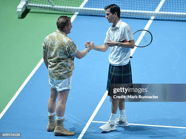 Comedy character Gary Tank Commander , Replaces Grigor Dimitrov during the doubles match between Andy Murray and Jamie Murray of Scotland and Tim...