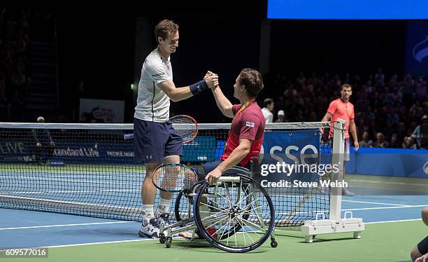 Andy Murray and paralympics Gold medal winner Gordon Reid celebrate a point against Tim Henman and Grigor Dimitrov during Andy Murray Live presented...