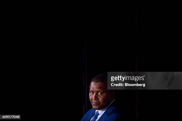 Aliko Dangote, president and chief executive officer of Dangote Sugar Refinery Plc, listens during the U.S. Africa Business Forum in New York, U.S.,...