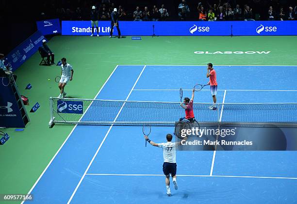 Gold Medal Paralympian Gordon Reid replaces Jamie Murray during the doubles match between Andy Murray and Jamie Murray of Scotland and Tim Henman of...